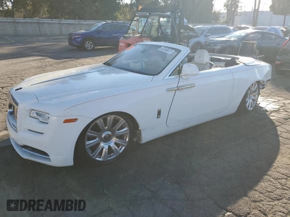 ✅ 2016 Rolls-Royce Dawn • VIN: SCA666D53GU102324 • Lot: 91021205. Listed on Copart with Not provided. Free auction sales archive from the USA and detailed vehicle history report at DreamBid. Image 1.