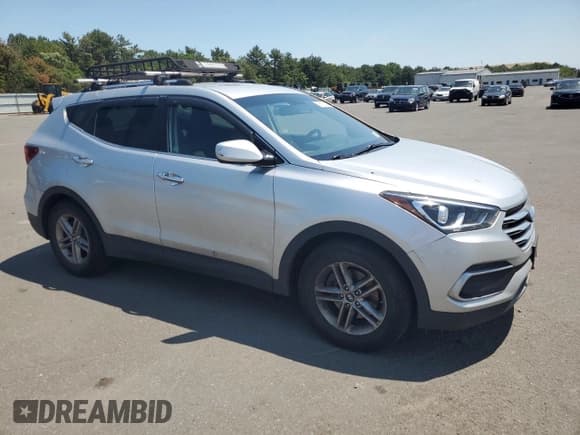 ✅ 2018 Hyundai Santa Fe 2.4L • VIN: 5XYZT3LBXJG569799 • Лот: 60612254. Опубликован ранее на Copart с пробегом 94 415 миль. Бесплатный доступ к архиву аукционных продаж из США и подробный отчёт об истории автомобиля на DreamBid. Изображение 4.