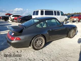 ✅ 1995 Porsche 911 Carrera • VIN: WP0AA2994SS323280 • Lot: 75304104. Wystawiony na Copart z przebiegiem 105 675 mil. Bezpłatny archiwum sprzedaży aukcyjnych z USA i szczegółowy raport historii pojazdu na DreamBid. Zdjęcie 3.