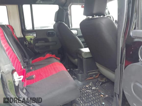 ✅ 2007 Jeep Wrangler Unlimited Sahara • VIN: 1J8GA59187L104774 • Lot: 42485359. Listed on IAAI with 192,254 mi. Free auction sales archive from the USA and detailed vehicle history report at DreamBid. Image 8.