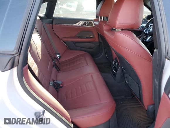 ✅ 2023 BMW i4 eDrive40 • VIN: WBY73AW05PFN81536 • Lot: 90058295. Listed on Copart with 48,275 mi. Free auction sales archive from the USA and detailed vehicle history report at DreamBid. Image 10.