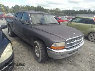 ✅ 2002 Dodge Dakota SLT • VIN: 1B7HL48X12S560958 • Лот: 42387059. Опубликован ранее на IAAI с пробегом 212 527 миль. Бесплатный доступ к архиву аукционных продаж из США и подробный отчёт об истории автомобиля на DreamBid. Изображение 1.