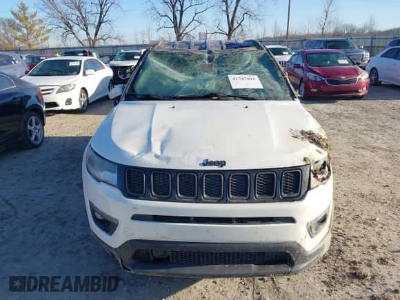 2019 Jeep Compass Limited with VIN 3C4NJDCB0KT664943, listed as a IAAI auction lot 41747015 with 89,199 mi miles and . Bid and sale history available at DreamBid. Image 6.