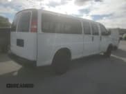 ✅ 2014 Chevrolet Express Passenger 1LS • VIN: 1GAZGZFAXE1105162 • Lot: 72773154. Listed on Copart with 97,950 mi. Free auction sales archive from the USA and detailed vehicle history report at DreamBid. Image 3.
