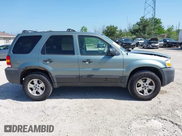 ✅ 2007 Ford Escape XLT • VIN: 1FMYU93137KB69665 • Lot: 42565001. Listed on IAAI with 198,548 mi. Free auction sales archive from the USA and detailed vehicle history report at DreamBid. Image 13.
