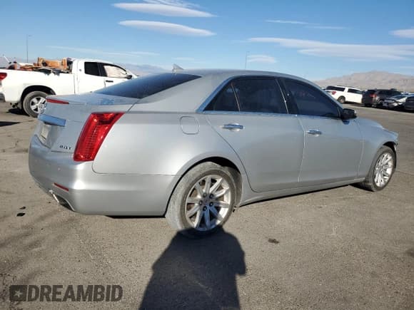 ✅ 2014 Cadillac CTS RWD • VIN: 1G6AP5SX5E0159954 • Lot: 71924635. Listed on Copart with 107,857 mi. Free auction sales archive from the USA and detailed vehicle history report at DreamBid. Image 3.