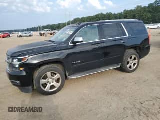 2015 Chevrolet Tahoe LTZ z VIN 1GNSCCKC9FR636937, wystawiony jako Copart lot #81036145 z przebiegiem 101 034 mil mil oraz Szkoda całkowita • Salvage title. Historia ofert i sprzedaży dostępna na DreamBid. Obrazek 1.