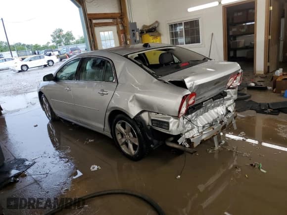 ✅ 2012 Chevrolet Malibu 1LT • VIN: 1G1ZC5E06CF107584 • Lot: 57402074. Listed on Copart with 164,493 mi. Free auction sales archive from the USA and detailed vehicle history report at DreamBid. Image 2.