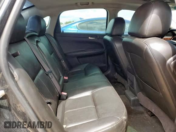 2013 Chevrolet Impala LTZ с VIN 2G1WC5E34D1184525, выставлен на аукционе Copart как лот 70579285 с пробегом 178 762 миль миль и Списание • Salvage title. История ставок и продаж доступна на DreamBid. Изображение 10.