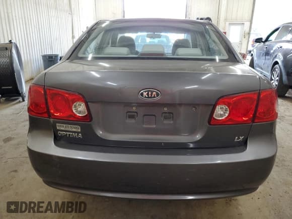 ✅ 2007 Kia Optima LX • VIN: KNAGE123975126297 • Лот: 72614294. Опубликован ранее на Copart с пробегом 128 766 миль. Бесплатный доступ к архиву аукционных продаж из США и подробный отчёт об истории автомобиля на DreamBid. Изображение 6.