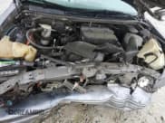 ✅ 1991 Chevrolet Caprice • VIN: 1G1BN53E1MW223013 • Лот: 49857604. Опубликован ранее на Copart с пробегом 224 278 миль. Бесплатный доступ к архиву аукционных продаж из США и подробный отчёт об истории автомобиля на DreamBid. Изображение 11.