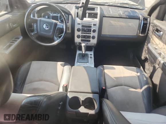 2010 Mercury Mariner Premier с VIN 4M2CN9HGXAKJ20666, выставлен на аукционе Copart как лот 80454315 с пробегом 163 103 миль миль и Списание • Salvage title. История ставок и продаж доступна на DreamBid. Изображение 8.