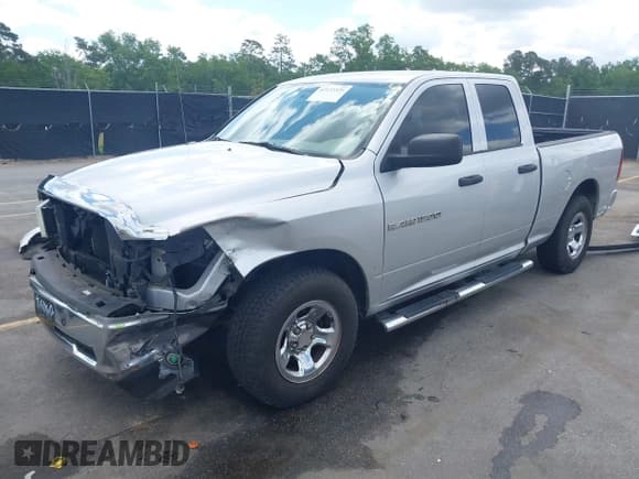 ✅ 2011 Ram 1500 SLT • VIN: 1D7RB1GP2BS500684 • Lot: 42133329. Listed on IAAI with 124,095 mi. Free auction sales archive from the USA and detailed vehicle history report at DreamBid. Image 2.