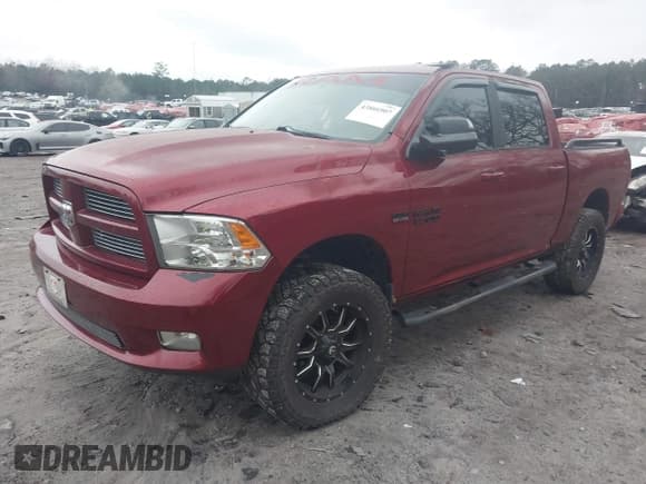 ✅ 2012 Ram 1500 Sport • VIN: 1C6RD7MTXCS208654 • Lot: 43866907. Listed on IAAI with 185,621 mi. Free auction sales archive from the USA and detailed vehicle history report at DreamBid. Image 2.