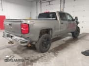 ✅ 2017 Chevrolet Silverado 2500HD Work Truck • VIN: 1GC1KUEG0HF128856 • Lot: 42046701. Listed on IAAI with 200,705 mi. Free auction sales archive from the USA and detailed vehicle history report at DreamBid. Image 4.