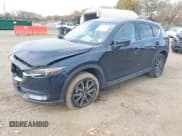 ✅ 2018 Mazda CX-5 Grand Touring • VIN: JM3KFBDM2J0468708 • Лот: 43571543. Опубликован ранее на IAAI с пробегом 210 942 миль. Бесплатный доступ к архиву аукционных продаж из США и подробный отчёт об истории автомобиля на DreamBid. Изображение 22.