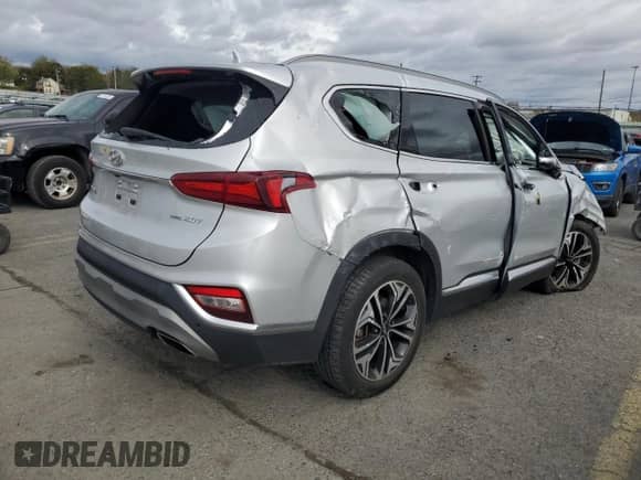 2020 Hyundai Santa Fe SEL with VIN 5NMS3CAA6LH149476, listed as a Copart auction lot 82646325 with Not provided miles and Salvage title. Bid and sale history available at DreamBid. Image 3.