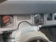 ✅ 1990 Jeep Wrangler S • VIN: 2J4FY19E8LJ545213 • Lot: 66768915. Wystawiony na Copart z przebiegiem 199 847 mil. Bezpłatny archiwum sprzedaży aukcyjnych z USA i szczegółowy raport historii pojazdu na DreamBid. Zdjęcie 9.