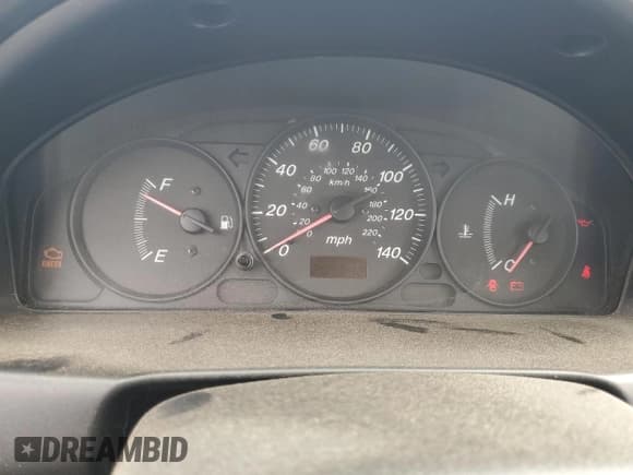 ✅ 2001 Mazda Protege DX • VIN: JM1BJ222310425181 • Lot: 88560255. Wystawiony na Copart z przebiegiem 201 942 mil. Bezpłatny archiwum sprzedaży aukcyjnych z USA i szczegółowy raport historii pojazdu na DreamBid. Zdjęcie 9.