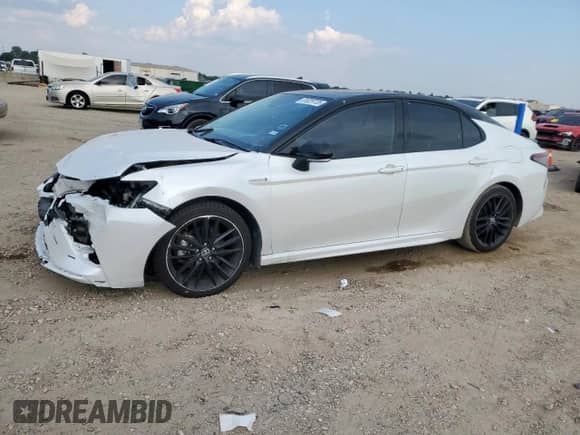 2021 Toyota Camry Hybrid XSE с VIN 4T1K31AK0MU026419, выставлен на аукционе Copart как лот 81029735 с пробегом 153 313 миль миль и Списание • Salvage title. История ставок и продаж доступна на DreamBid. Изображение 1.
