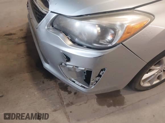 2013 Subaru Impreza Premium with VIN JF1GJAC67DH012385, listed as a IAAI auction lot 43053735 with 130,902 mi miles and . Bid and sale history available at DreamBid. Image 12.