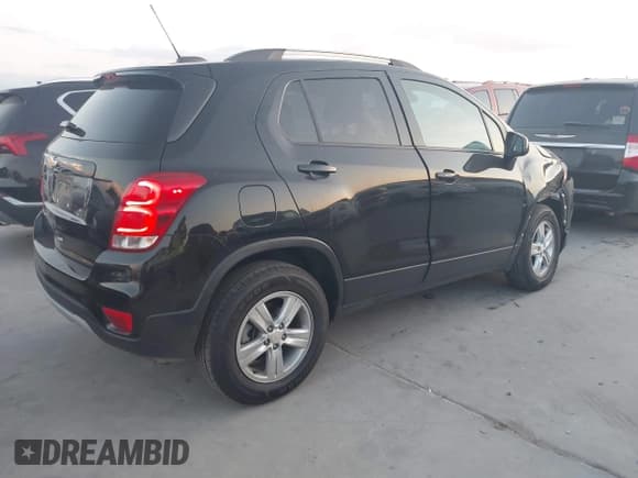 ✅ 2022 Chevrolet Trax LT • VIN: KL7CJPSM4NB503316 • Lot: 43513215. Listed on IAAI with 56,307 mi. Free auction sales archive from the USA and detailed vehicle history report at DreamBid. Image 4.