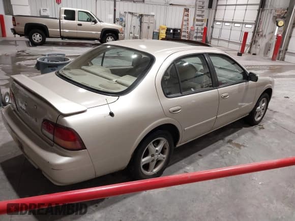 ✅ 1999 Nissan Maxima GXE • VIN: JN1CA21D3XM410448 • Lot: 42627996. Listed on IAAI with 170,781 mi. Free auction sales archive from the USA and detailed vehicle history report at DreamBid. Image 4.