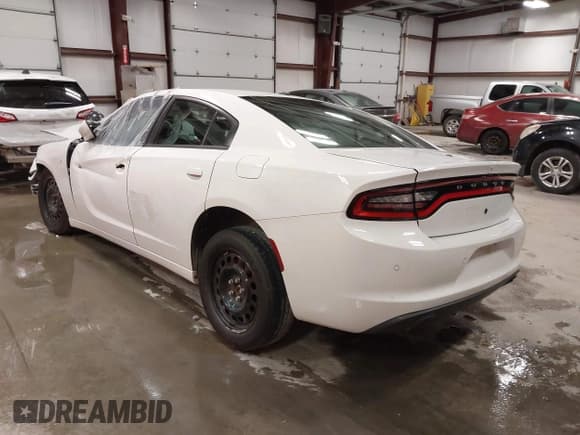 ✅ 2021 Dodge Charger Police • VIN: 2C3CDXKG7MH649112 • Lot: 42935599. Listed on IAAI with 23,819 mi. Free auction sales archive from the USA and detailed vehicle history report at DreamBid. Image 3.