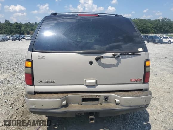✅ 2004 GMC Yukon Denali • VIN: 1GKEK63UX4J275865 • Lot: 69239575. Wystawiony na Copart z przebiegiem 182 891 mil. Bezpłatny archiwum sprzedaży aukcyjnych z USA i szczegółowy raport historii pojazdu na DreamBid. Zdjęcie 6.