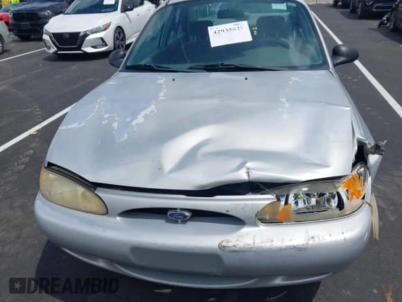 ✅ 1999 Ford Escort LX • VIN: 1FAFP10P6XW164410 • Lot: 42935825. Listed on IAAI with 159,409 mi. Free auction sales archive from the USA and detailed vehicle history report at DreamBid. Image 13.