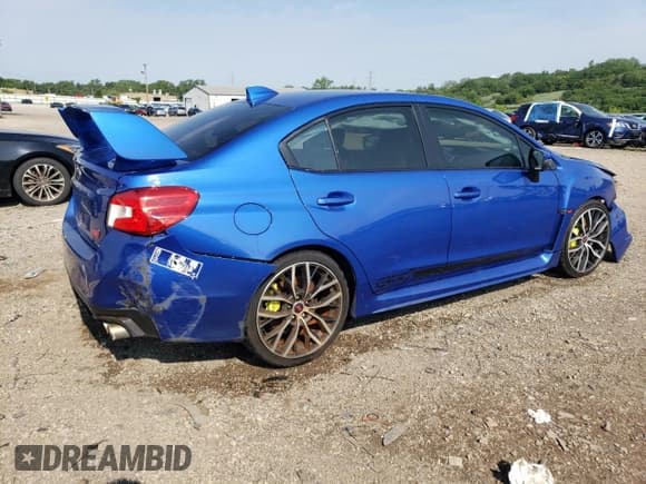 ✅ 2020 Subaru WRX STI • VIN: JF1VA2E69L9833328 • Lot: 66268315. Listed on Copart with 87,060 mi. Free auction sales archive from the USA and detailed vehicle history report at DreamBid. Image 3.