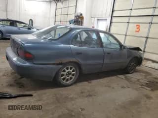 ✅ 1994 Geo Prizm • VIN: 1Y1SK5361RZ040706 • Lot: 46409095. Listed on Copart with 171,255 mi. Free auction sales archive from the USA and detailed vehicle history report at DreamBid. Image 3.