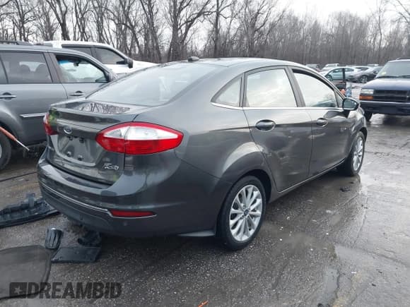 ✅ 2018 Ford Fiesta Titanium • VIN: 3FADP4CJ8JM117662 • Lot: 41199756. Listed on IAAI with 101,625 mi. Free auction sales archive from the USA and detailed vehicle history report at DreamBid. Image 4.
