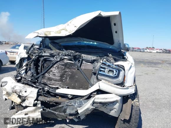 ✅ 2017 GMC Sierra 1500 Denali • VIN: 3GTU2PEJ0HG147836 • Lot: 43410221. Listed on IAAI with 98,619 mi. Free auction sales archive from the USA and detailed vehicle history report at DreamBid. Image 12.