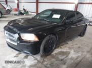 ✅ 2013 Dodge Charger SE • VIN: 2C3CDXBG3DH720189 • Lot: 43682173. Listed on IAAI with 210,704 mi. Free auction sales archive from the USA and detailed vehicle history report at DreamBid. Image 2.