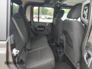 ✅ 2022 Jeep Gladiator Texas Trail • VIN: 1C6HJTAG5NL176147 • Лот: 64410375. Опубликован ранее на Copart с пробегом 47 628 миль. Бесплатный доступ к архиву аукционных продаж из США и подробный отчёт об истории автомобиля на DreamBid. Изображение 11.