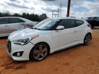 ✅ 2014 Hyundai Veloster Turbo • VIN: KMHTC6AE0EU210661 • Lot: 42590675. Wystawiony na Copart z przebiegiem 127 657 mil. Bezpłatny archiwum sprzedaży aukcyjnych z USA i szczegółowy raport historii pojazdu na DreamBid. Zdjęcie 1.