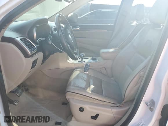 ✅ 2014 Jeep Grand Cherokee Overland • VIN: 1C4RJFCG1EC547509 • Lot: 82337765. Listed on Copart with 111,173 mi. Free auction sales archive from the USA and detailed vehicle history report at DreamBid. Image 7.