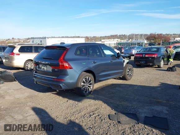 ✅ 2023 Volvo XC60 Plus Dark Theme • VIN: YV4L12RW9P1305785 • Lot: 43686299. Listed on IAAI with 12,763 mi. Free auction sales archive from the USA and detailed vehicle history report at DreamBid. Image 4.