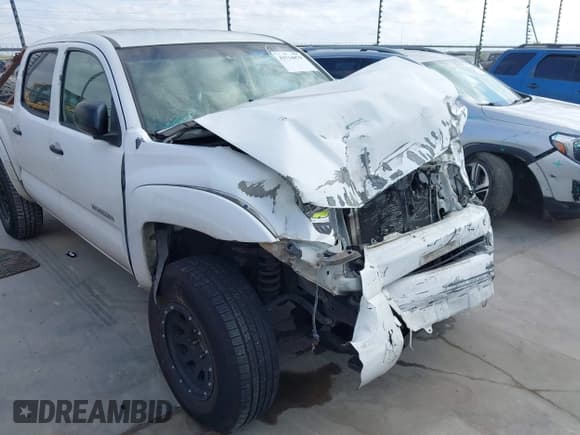 ✅ 2009 Toyota Tacoma PreRunner • VIN: 3TMJU62N19M077233 • Lot: 43714879. Listed on IAAI with 284,912 mi. Free auction sales archive from the USA and detailed vehicle history report at DreamBid. Image 6.