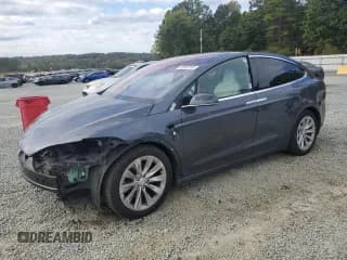 ✅ 2017 Tesla Model X 90D • VIN: 5YJXCAE29HF060278 • Lot: 82002745. Listed on Copart with 198,596 mi. Free auction sales archive from the USA and detailed vehicle history report at DreamBid. Image 1.