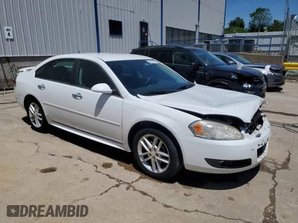2012 Chevrolet Impala LTZ z VIN 2G1WC5E38C1292774, wystawiony jako Copart lot #63310415 z przebiegiem 153 804 mil mil oraz Szkoda całkowita • Salvage title. Historia ofert i sprzedaży dostępna na DreamBid. Obrazek 4.