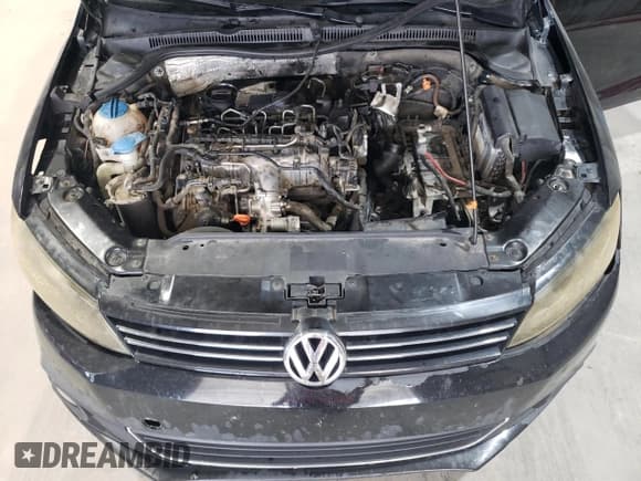 ✅ 2013 Volkswagen Jetta TDI w/Premium/Nav • VIN: 3VW3L7AJ2DM292383 • Lot: 66886315. Listed on Copart with 193,519 mi. Free auction sales archive from the USA and detailed vehicle history report at DreamBid. Image 11.