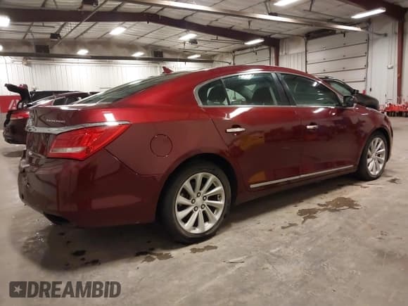 ✅ 2014 Buick LaCrosse Leather • VIN: 1G4GB5G37EF305257 • Lot: 43488757. Listed on IAAI with 129,652 mi. Free auction sales archive from the USA and detailed vehicle history report at DreamBid. Image 4.