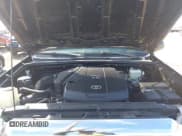 ✅ 2015 Toyota Tacoma • VIN: 3TMLU4EN2FM169326 • Lot: 40689500. Listed on IAAI with 77,003 mi. Free auction sales archive from the USA and detailed vehicle history report at DreamBid. Image 10.