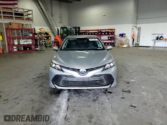 ✅ 2019 Toyota Camry Hybrid LE • VIN: 4T1B31HK1KU005193 • Лот: 84923905. Опубликован ранее на Copart с пробегом 73 983 миль. Бесплатный доступ к архиву аукционных продаж из США и подробный отчёт об истории автомобиля на DreamBid. Изображение 13.