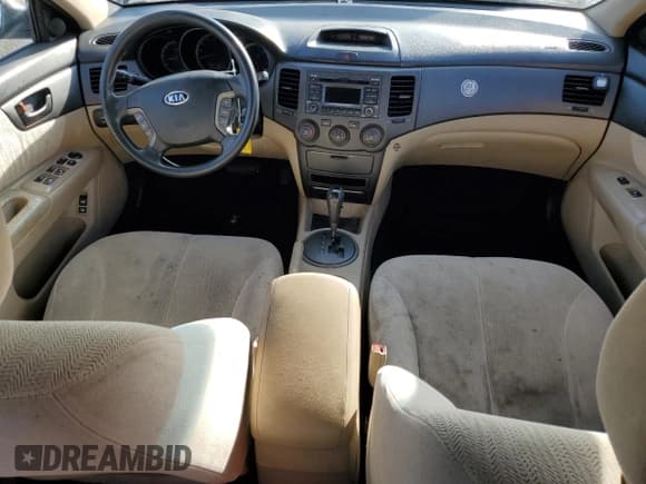 ✅ 2010 Kia Optima LX • VIN: KNAGG4A86A5379903 • Лот: 73708134. Опубликован ранее на Copart с пробегом 173 994 миль. Бесплатный доступ к архиву аукционных продаж из США и подробный отчёт об истории автомобиля на DreamBid. Изображение 8.