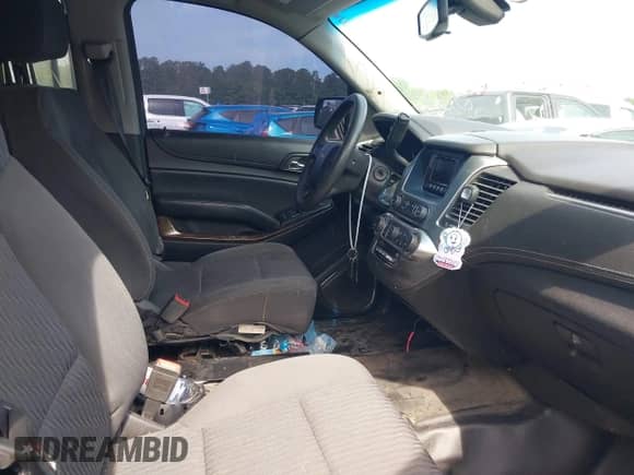 2016 Chevrolet Tahoe Commercial with VIN 1GNSKDEC9GR351872, listed as a IAAI auction lot 42239404 with 144,693 mi miles and . Bid and sale history available at DreamBid. Image 5.