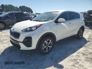 ✅ 2021 Kia Sportage LX • VIN: KNDPM3AC2M7893931 • Lot: 84815945. Listed on Copart with 74,249 mi. Free auction sales archive from the USA and detailed vehicle history report at DreamBid. Image 1.