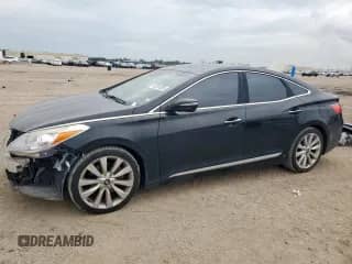 2015 Hyundai Azera Limited с VIN KMHFH4JG7FA476637, выставлен на аукционе Copart как лот 65324555 с пробегом 145 592 миль миль и Списание • Salvage title. История ставок и продаж доступна на DreamBid. Изображение 1.